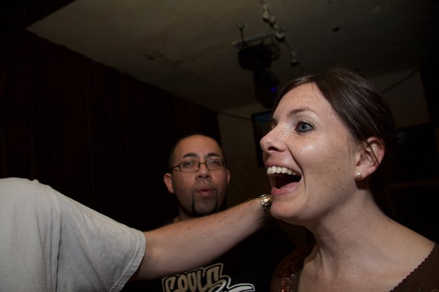 Laughing Woman Surprised at Art Walk Party