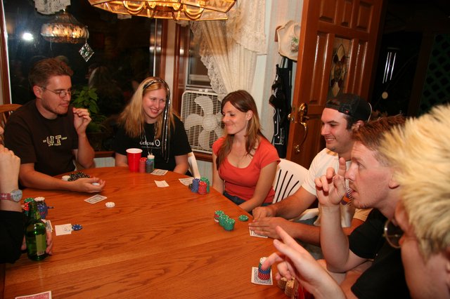 Friends Enjoy Late Night Home Poker Game