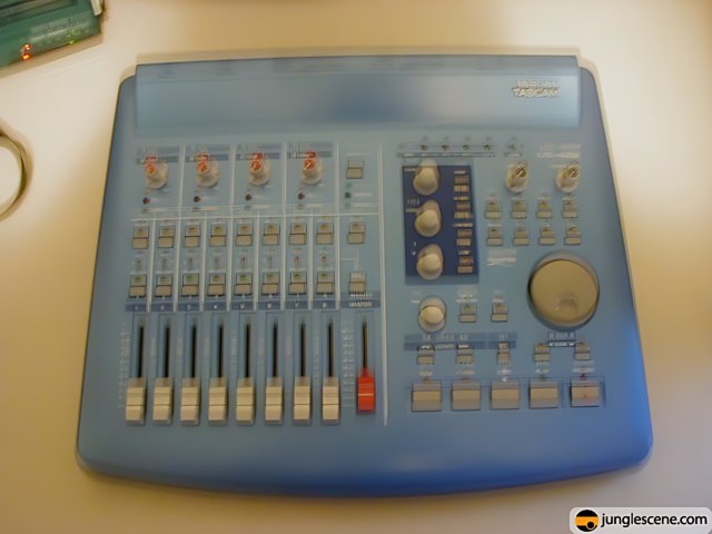 Blue Mixer with Various Knobs and Buttons