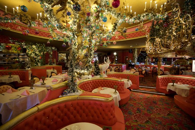 Lavishly Decorated Christmas Restaurant with Ornate Tree Display