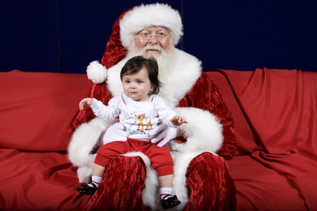 A Baby's First Encounter with Santa at the APC Xmas Party