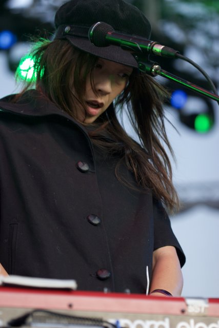 Kazu Makino Performing in Black Coat