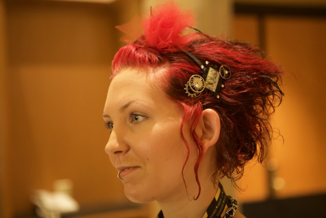 Red-Haired Beauty with Statement Necklace