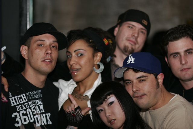 2006 Group Photo with Baseball Caps and Tattoos