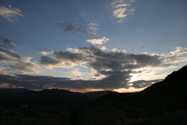 Desert Sunset: A Melange of Mountains and Clouds
