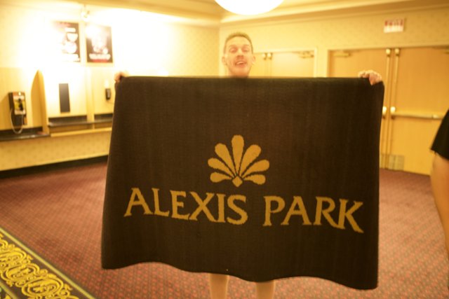 Alexis Park Sign Held by a Man at DEFCON 17