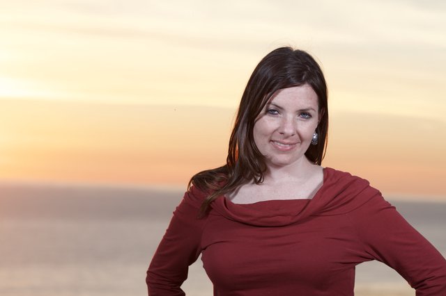 Woman in Red at Golden Hour Seaside