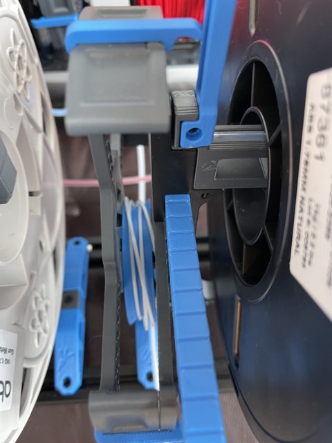 Blue and White Plastic Reel with Handle