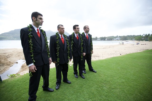 Four Men in Suits Enjoying a Day Outdoors