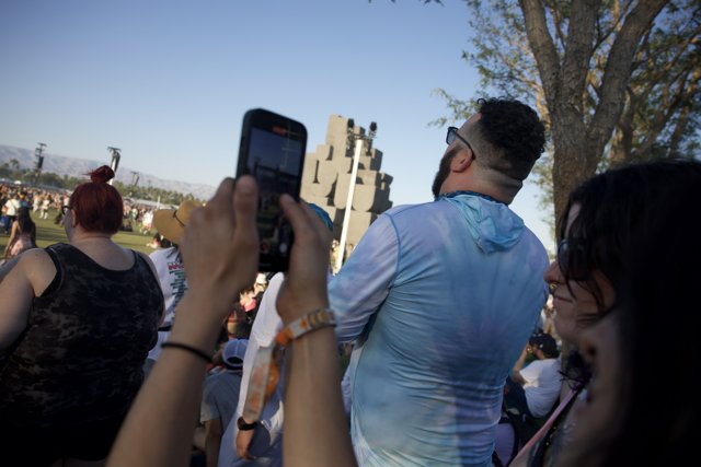 Digital Moments: A Crowd Engaged at Coachella 2024