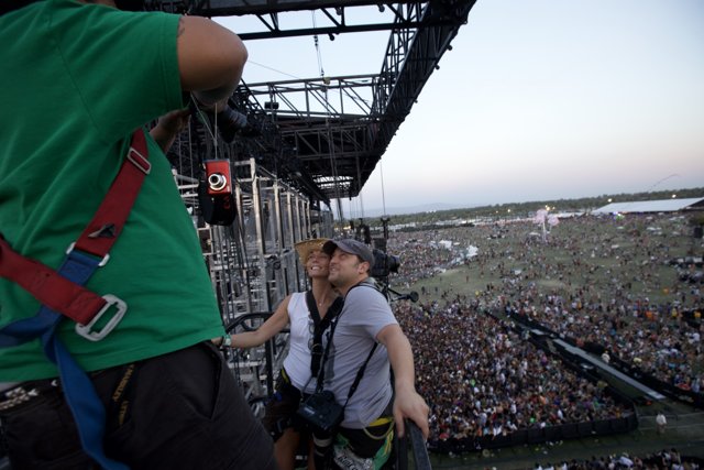 A Man Carrying the Weight of a Woman at Coachella