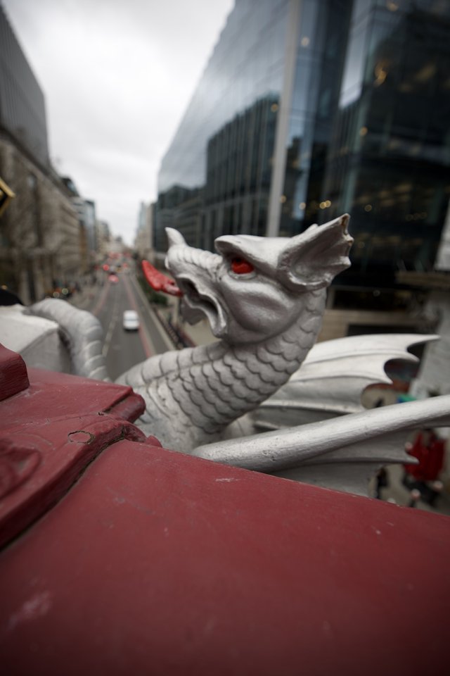 Silver Dragon Guardian Overlooking London Street