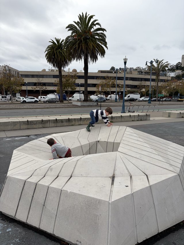 Children Playing on Sunken Circular Plaza Amphitheater