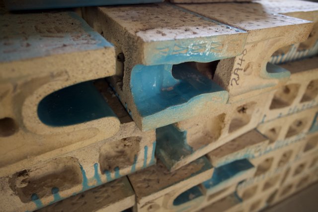 The Archaeological Mystery of the Blue Bricks with a Hole in the Middle