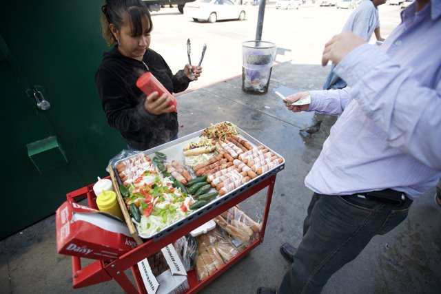 Man Grilling Meat at Indoor Restaurant