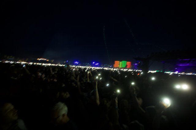 Phone lights up the night sky