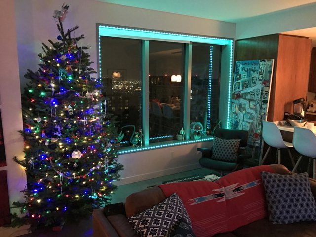 Festive Living Room with Christmas Tree and Window View