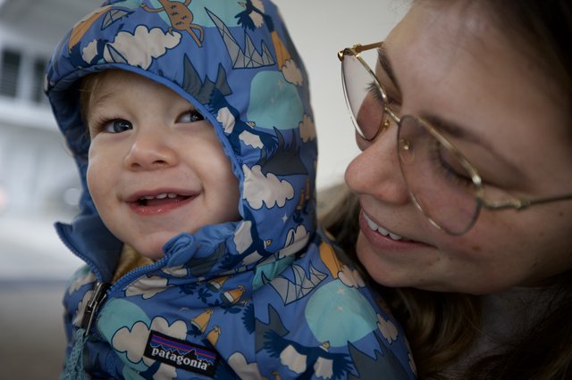 Joyful Winter Moment: Parent and Child Outdoors