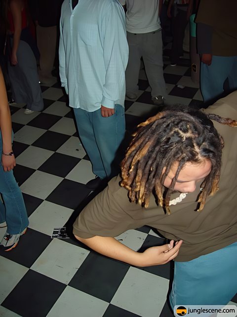 Dreadlocked man grooves to the beat