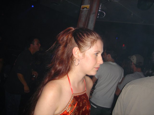 Red-Haired Woman in a Nightclub