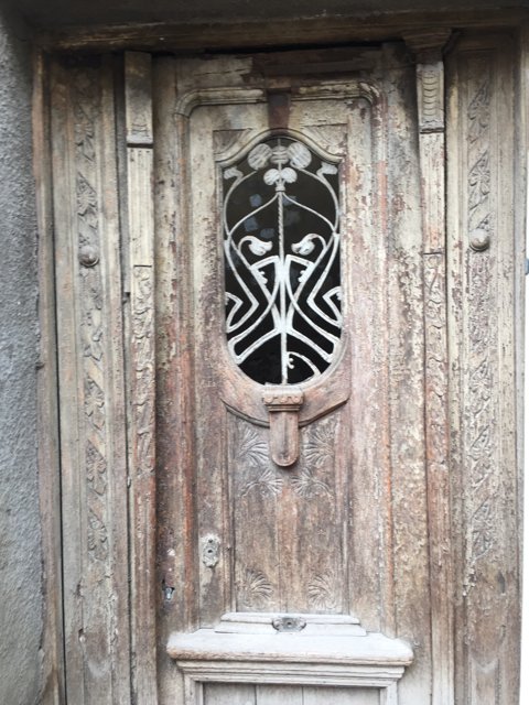 The Face on the Wooden Door