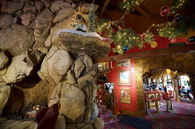 Festive Christmas Decorations Inside Madonna Inn's Rock-Walled Interior