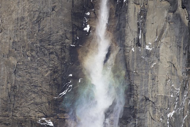 Yosemite Waterfall Cascading Down Granite Cliff Face