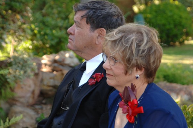 Proud Parents Watch On at Outdoor Wedding Ceremony