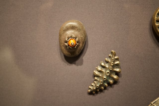 Ancient Metal Jewelry and Ornamental Artifacts Display