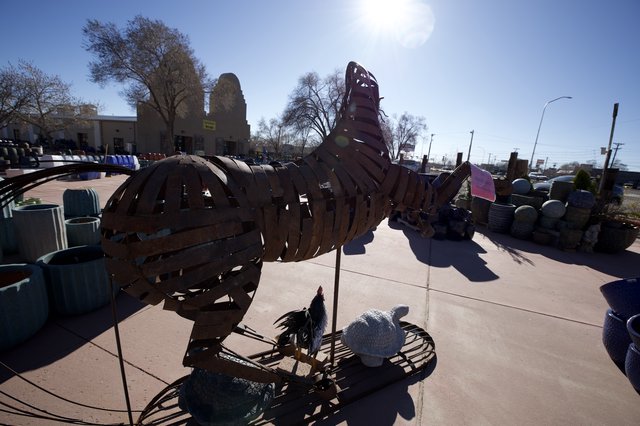 Rustic Metal Rooster Sculpture in Southwest Garden Center