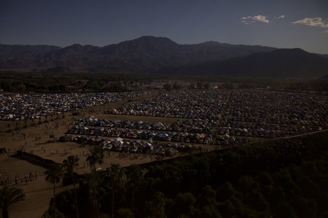 Aerial View of Coachella Campground with Majestic Mountains in the Background