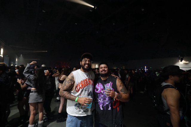 Friends Raising Drinks at Wobbleland Festival 2026