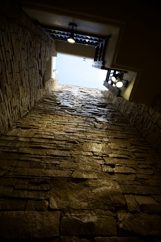 Ancient Stone Stairway Leading to Light Above