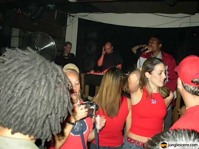 Nightclub Fun with Red Shirts and Black Pants
