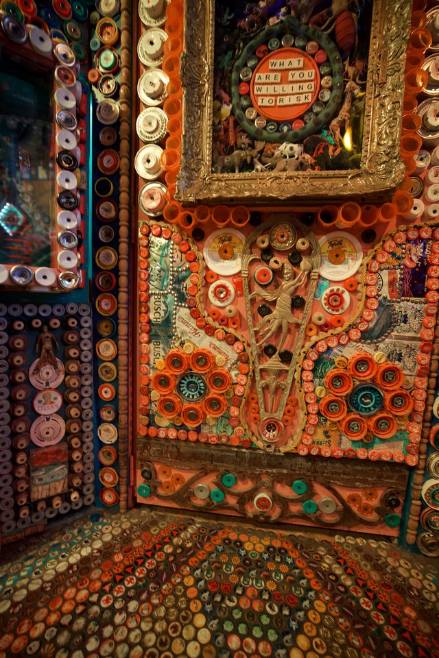 Intricate Folk Art Installation with Buttons and Found Objects