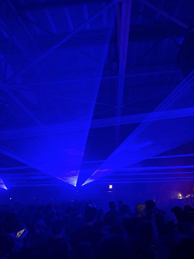 Intense Blue Laser Show at Electronic Music Concert