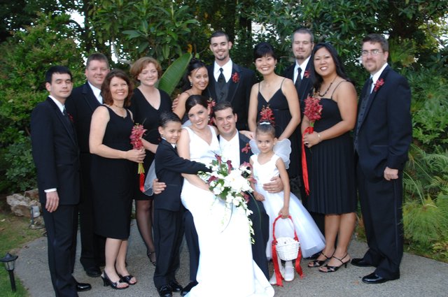 Joyful Wedding Party Celebration in Lush Garden Setting