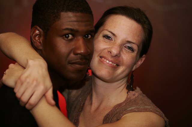 Couple Embracing at Evening Dance Event