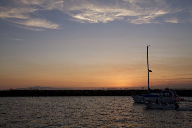 Sailboats on Lake at Sunset
