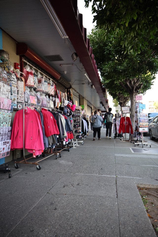 Street Market Shopping District with Colorful Clothing Displays