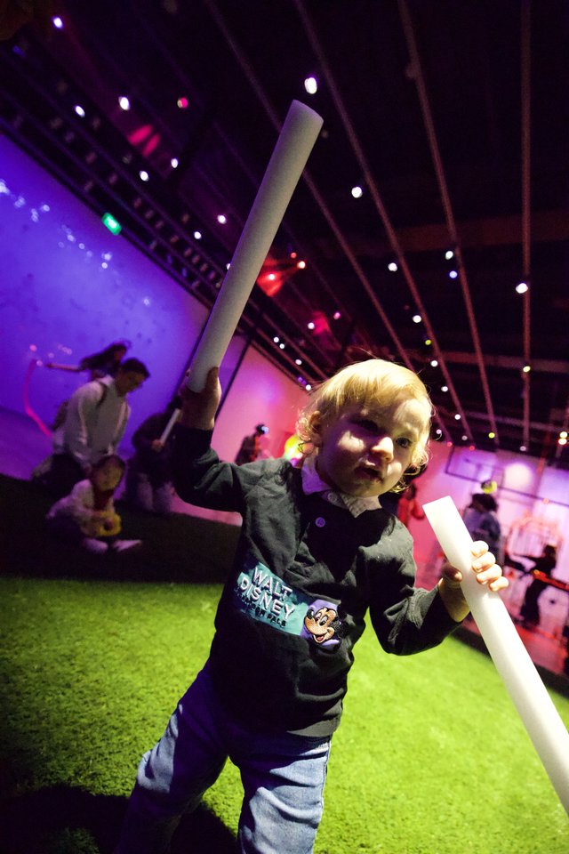 Toddler's Joyful Moment at Baby Rave Event