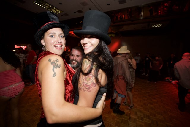 Tattooed Ladies at the Hat Party