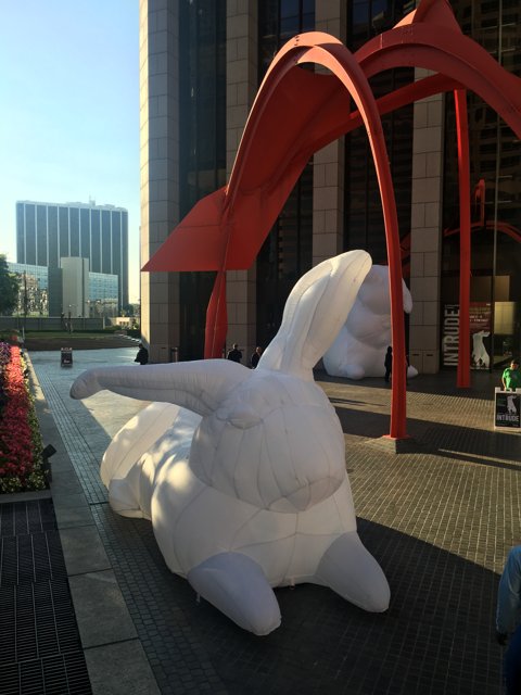 White Rabbit Statue in front of Office Building