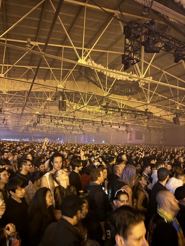 Massive Crowd at Indoor Electronic Music Festival