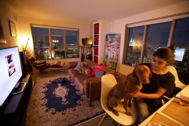 Woman and Dog in Chic Living Room