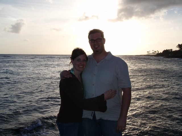 Couple Embracing at Tropical Sunset Oceanfront