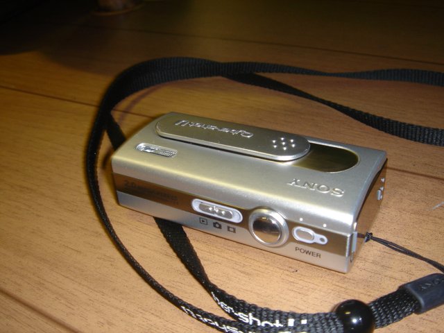 Silver Digital Camera with Accessories