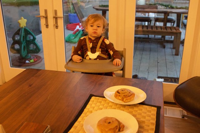 Toddler Waiting for Christmas Breakfast Pastries