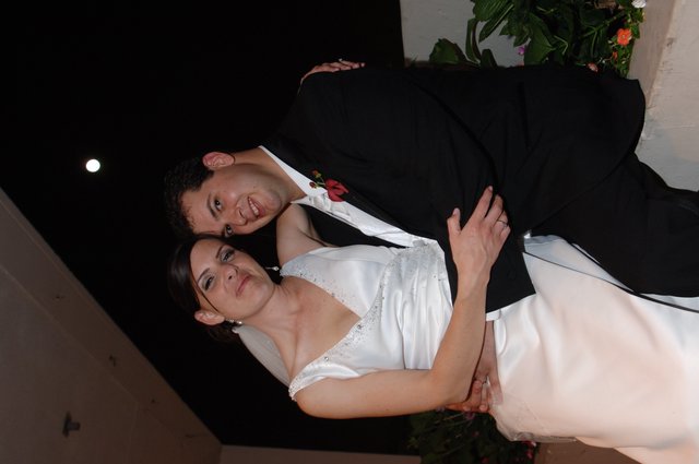Newlyweds Share Tender Moment at Wedding Reception