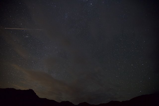 Shooting Star Over the Mountains